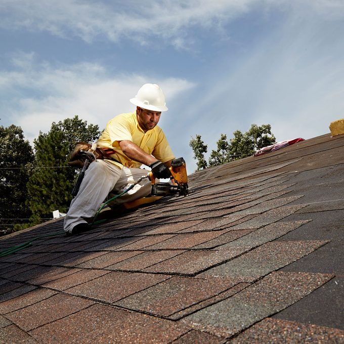 Roofing a house A man roofing a house | Construction Pro Tips