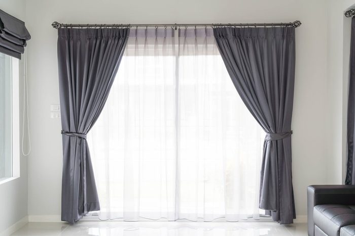 Curtain interior decoration in living room with sunlight