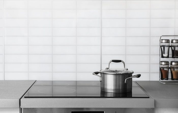 Casserole pot on electric stove in kitchen