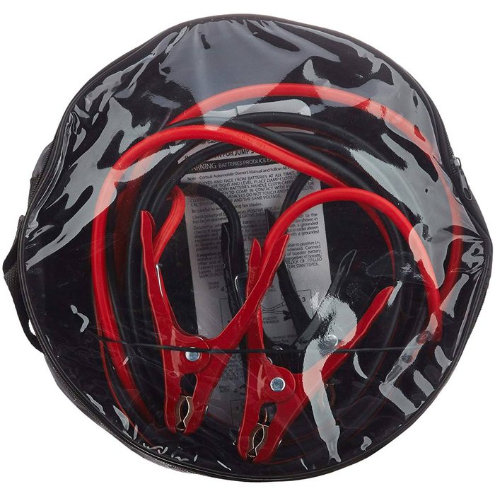 Car jumper cables coiled in a clear plastic bag