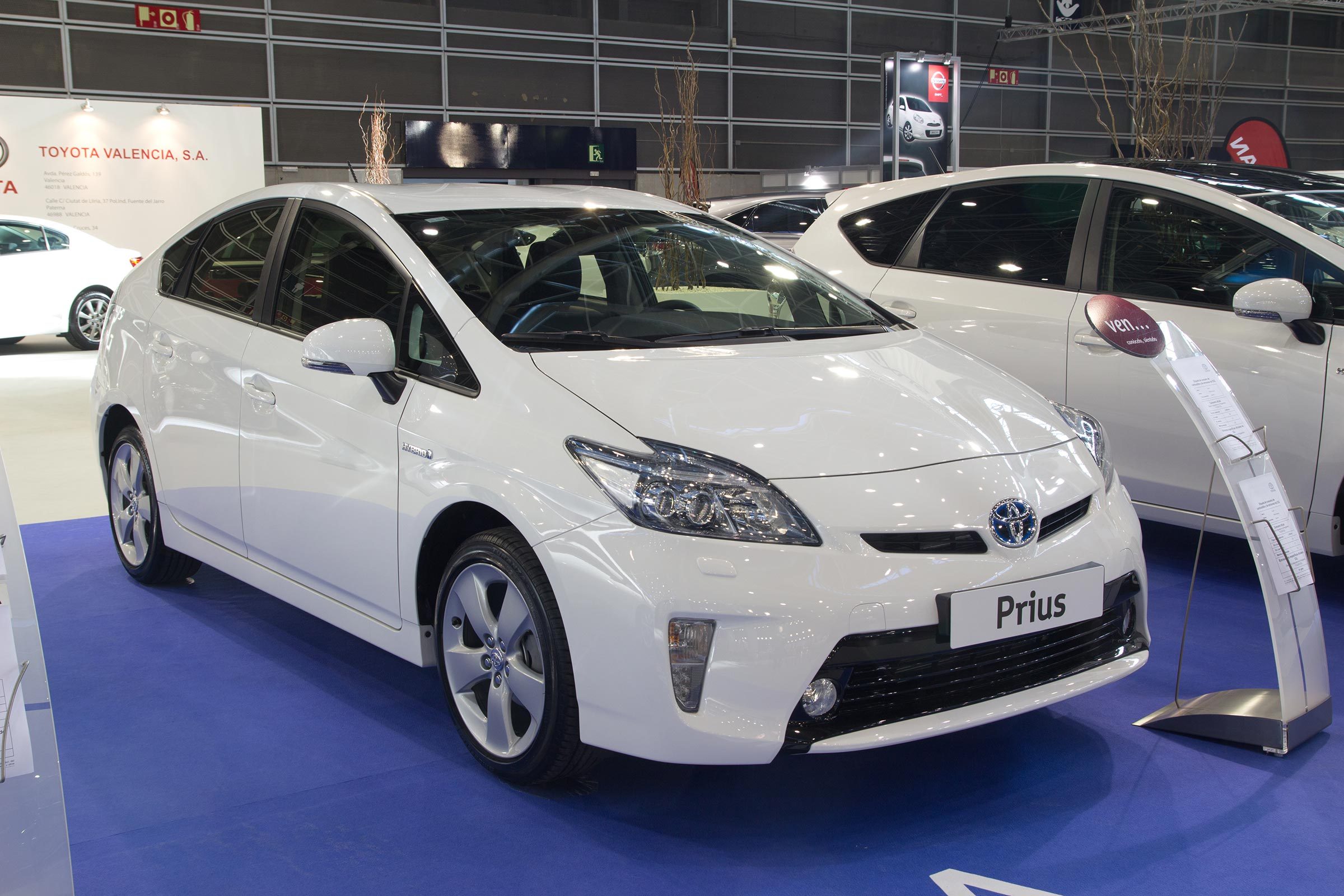 VALENCIA, SPAIN - DECEMBER 7 - A White 2012 Toyota Prius Hybrid Vehicle at the Valencia Car Show on December 7, 2012 in Valencia, Spain.