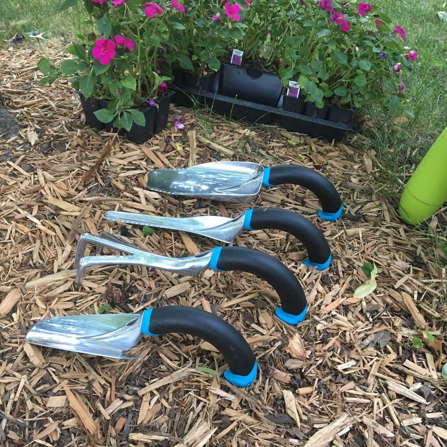 Small gardening shovels in a row