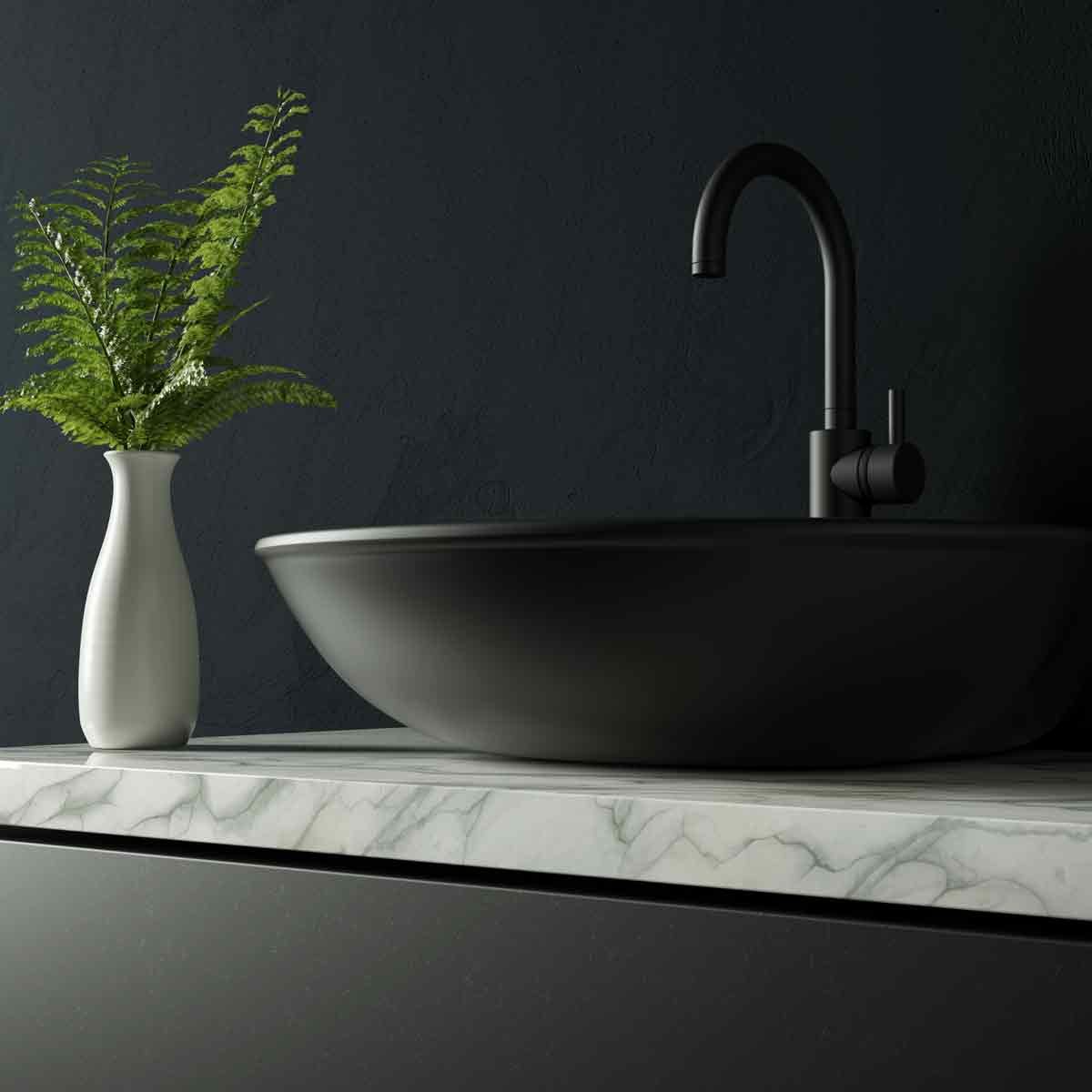 Black-bathroom-with-marble-and-water-faucet