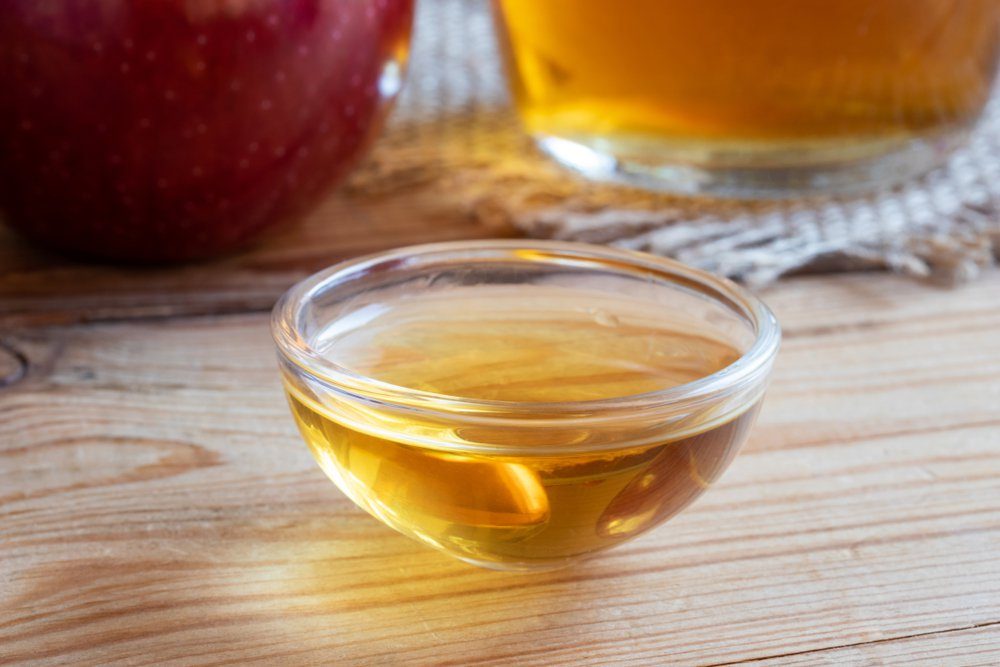 A bowl of apple cider vinegar