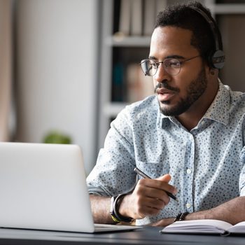 man working online video chatting computer online call