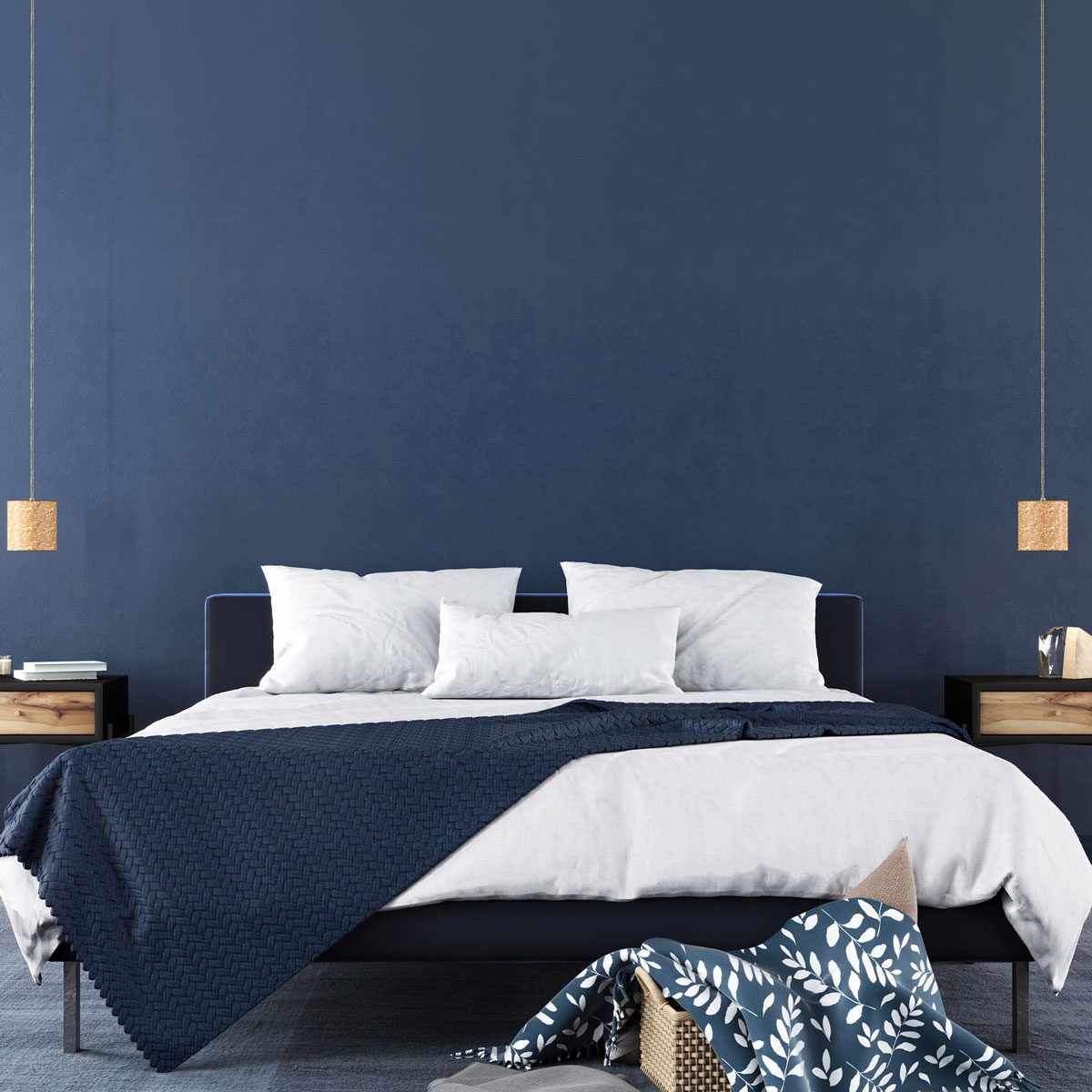 Bedroom with navy blue walls and accents