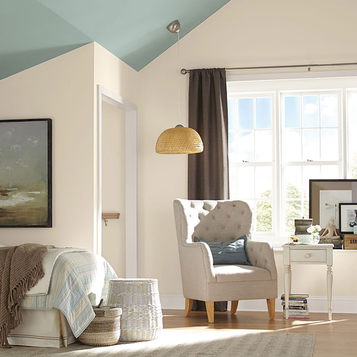 Bedroom with white walls and a blue ceiling