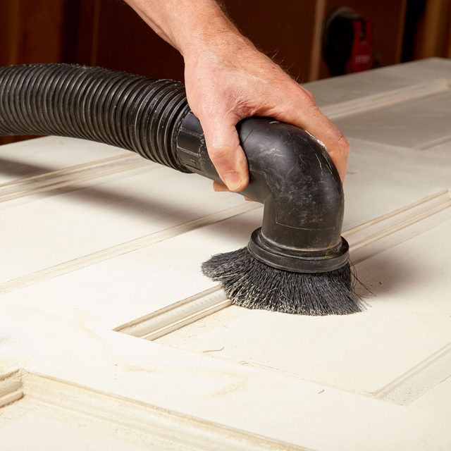 Remove the sanding dust from door