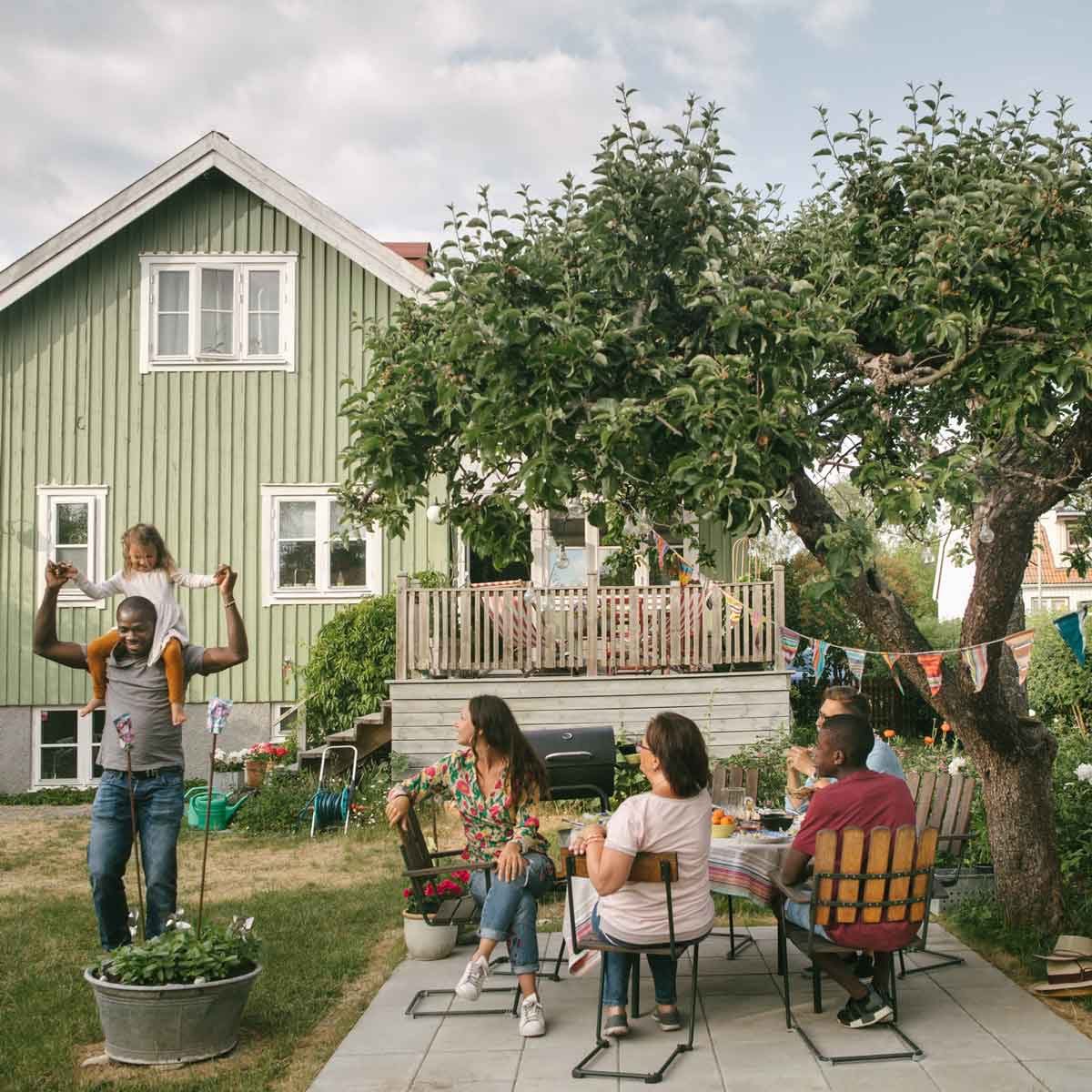 Family enjoying a shady patio