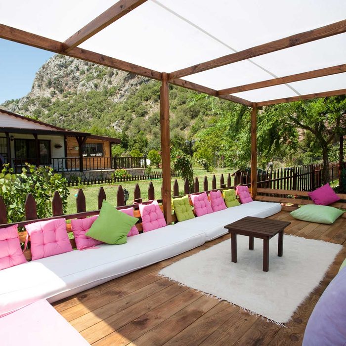 Pergola with a shade sail