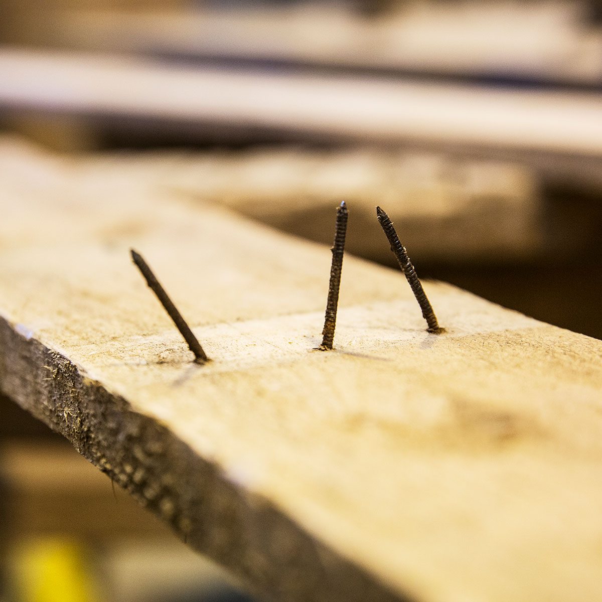 nails coming out of wood