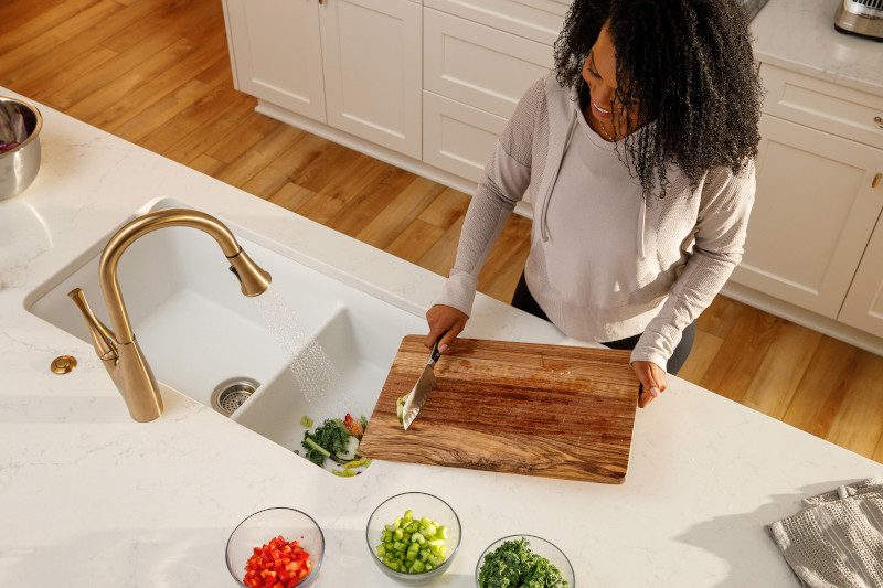 Woman chopping vegetables