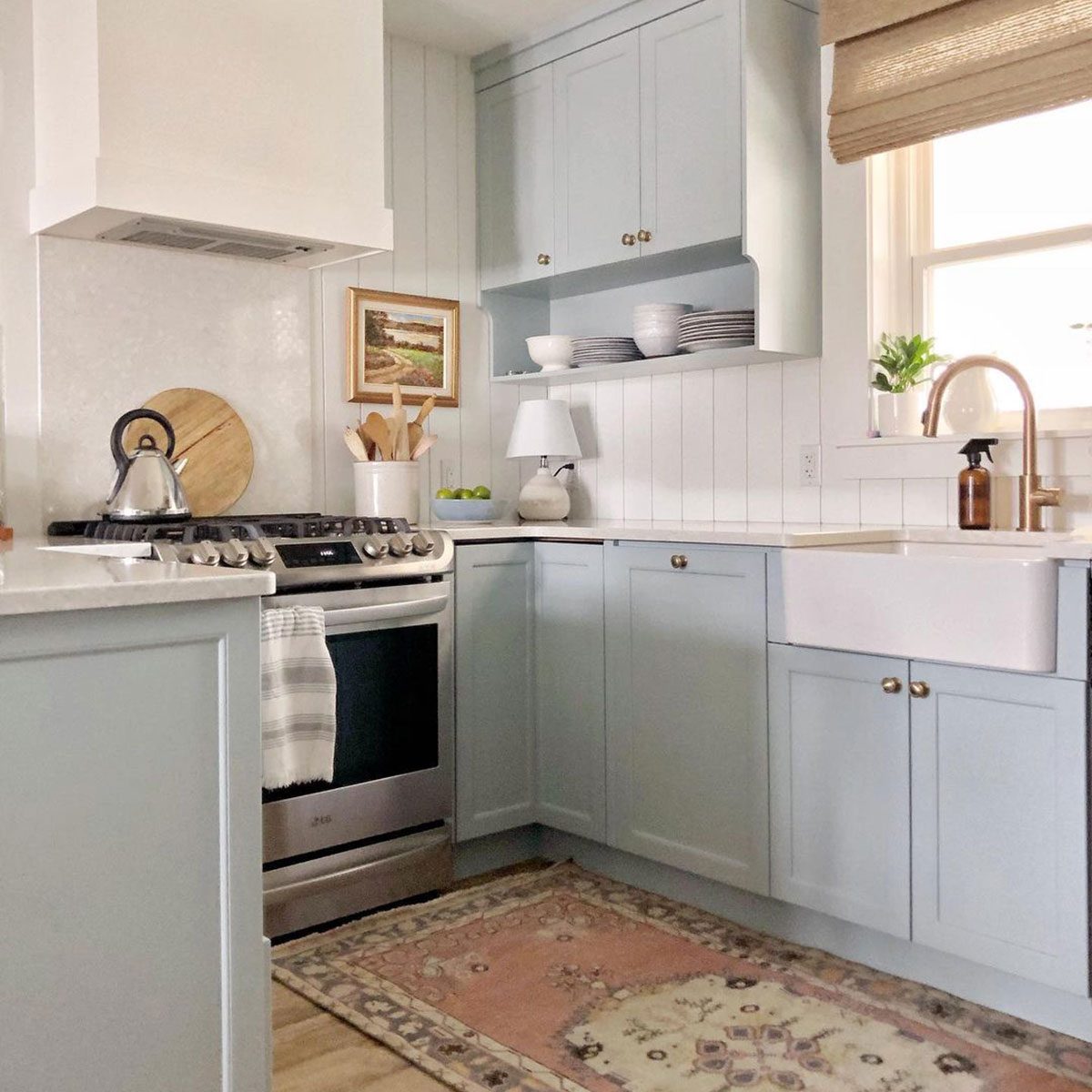 Kitchen with light blue cabinets