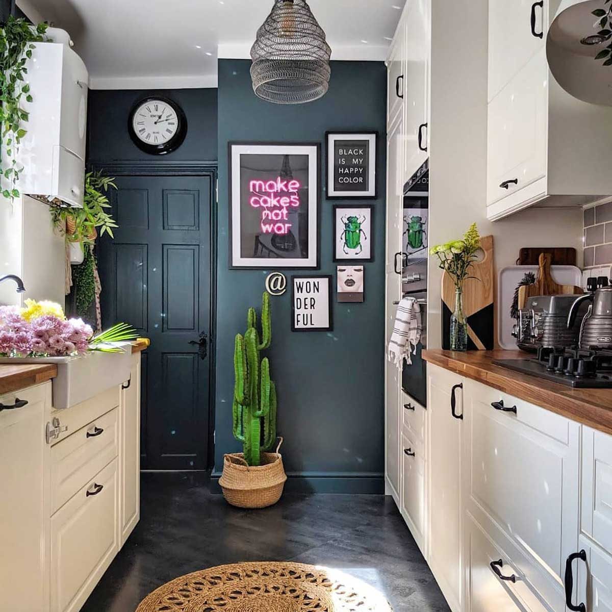 Kitchen with a dark accent wall