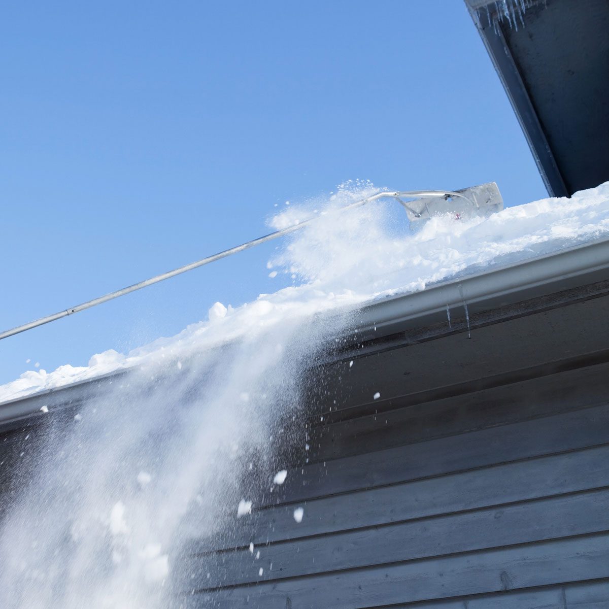 Raking snow from roof