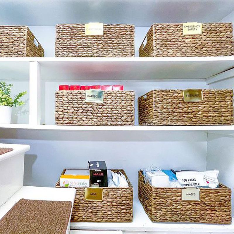 woven baskets on storage shelves for a home office