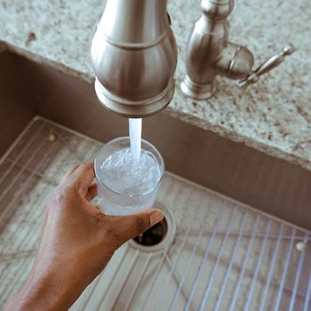 Filling up a glass of water