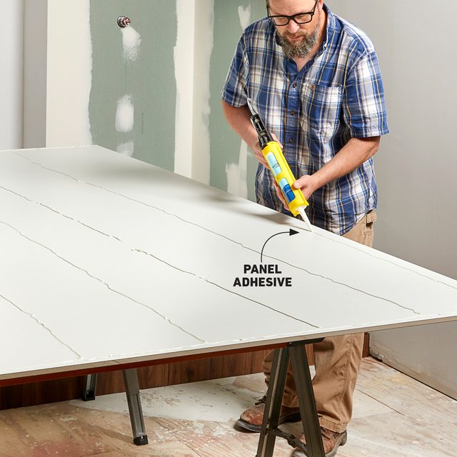 Applying panel adhesive using denatured alcohol