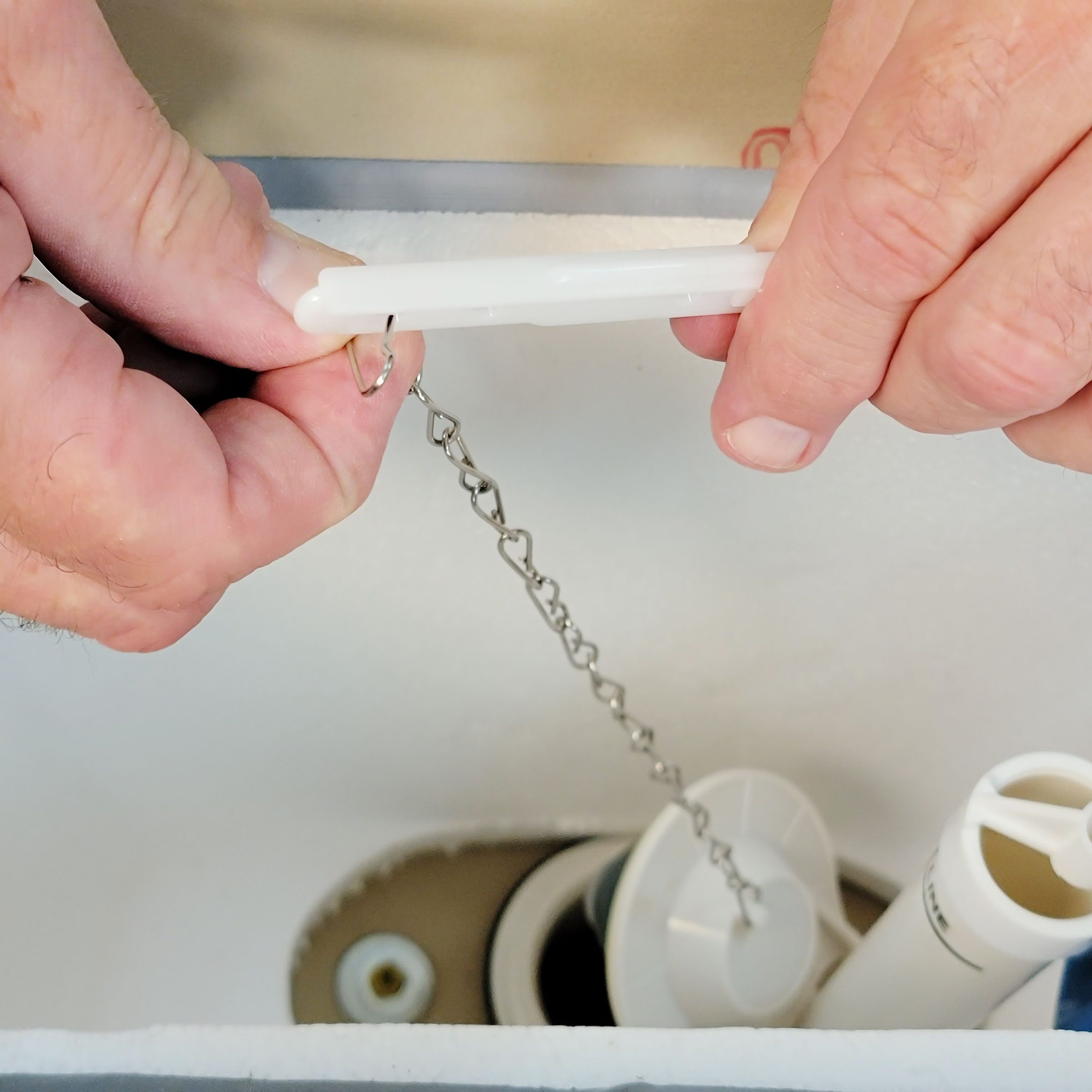 toilet chain repair