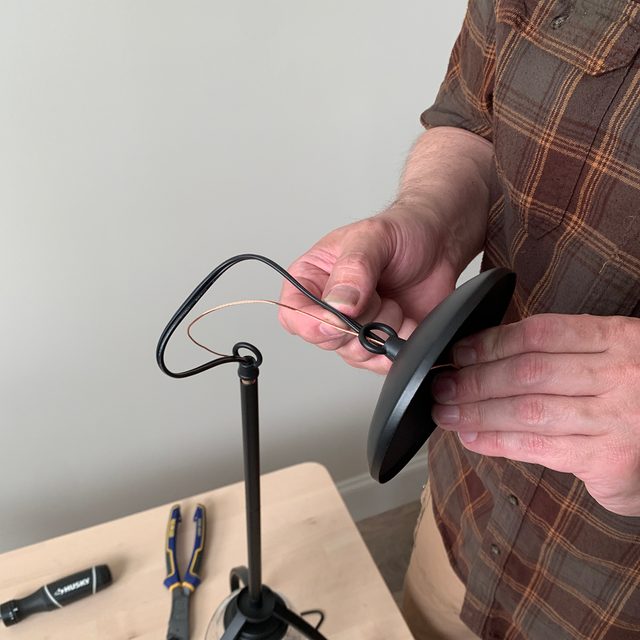 Attaching the pendant rod to the ceiling cap