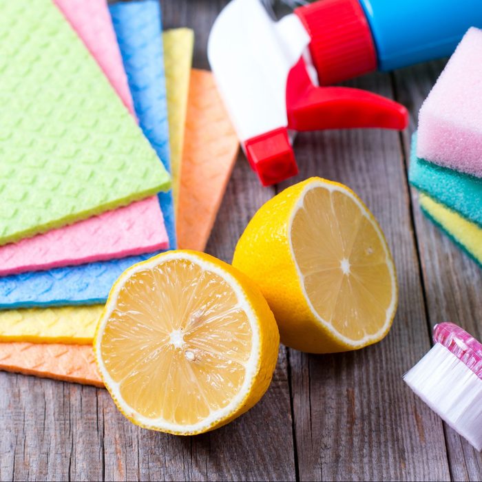 Eco-friendly natural cleaners on wooden table