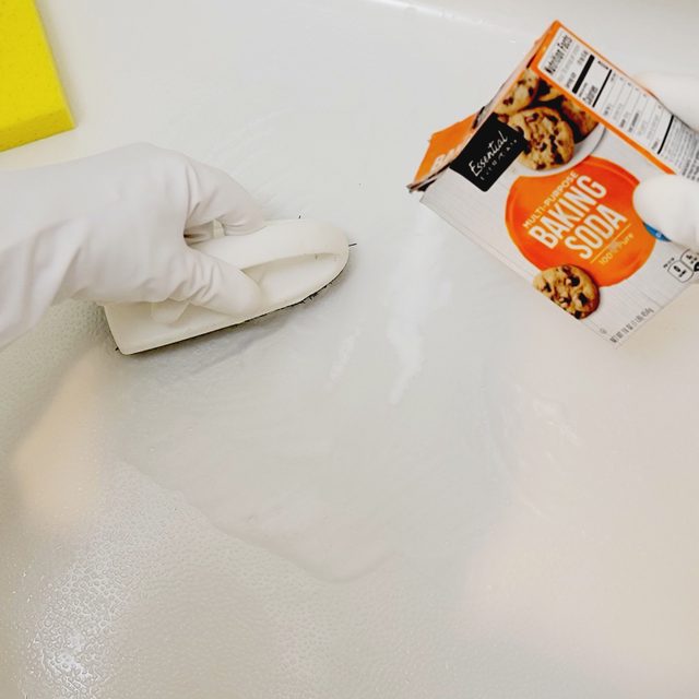 using baking soda paste to clean shower