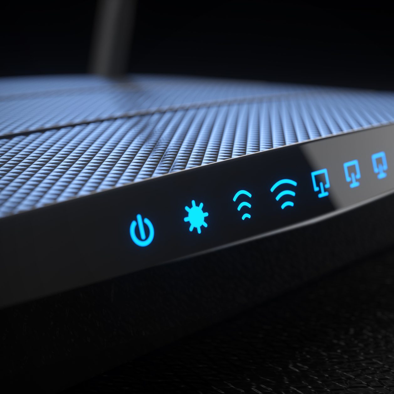 Wi-Fi wireless internet router on dark background