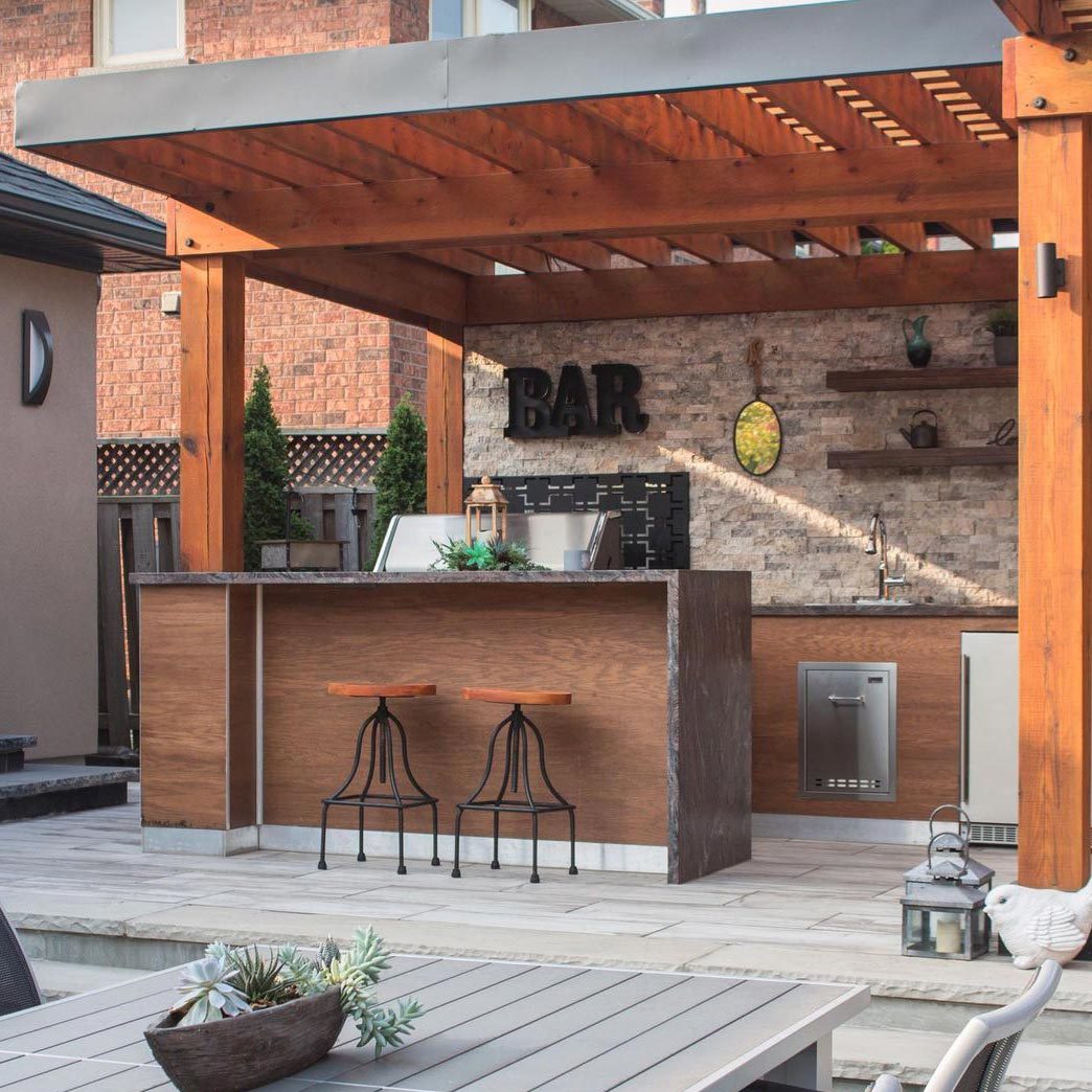 Waterfall Outdoor Kitchen Bar Idea
