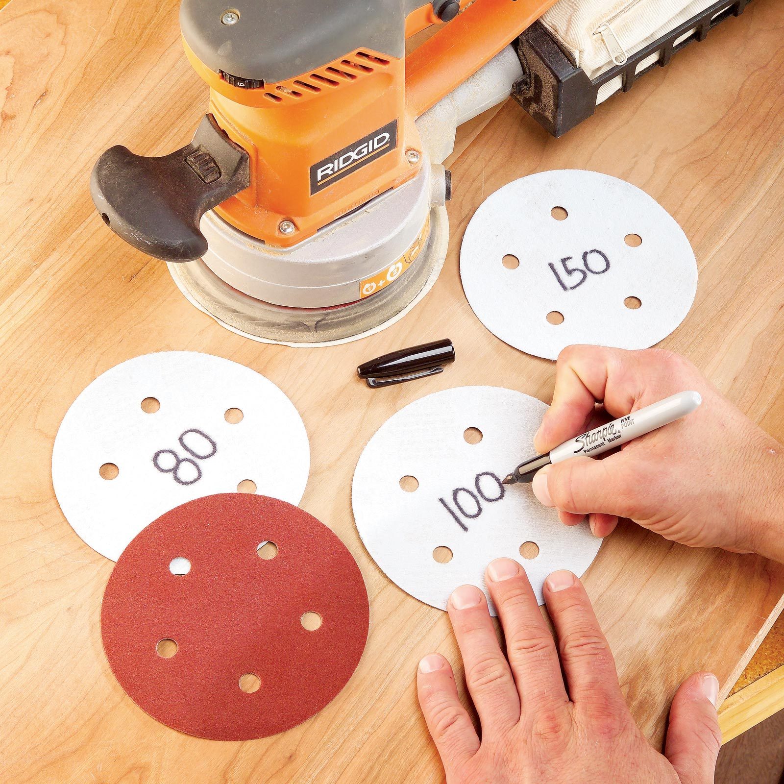 writing grit numbers on the back of sandpaper disks
