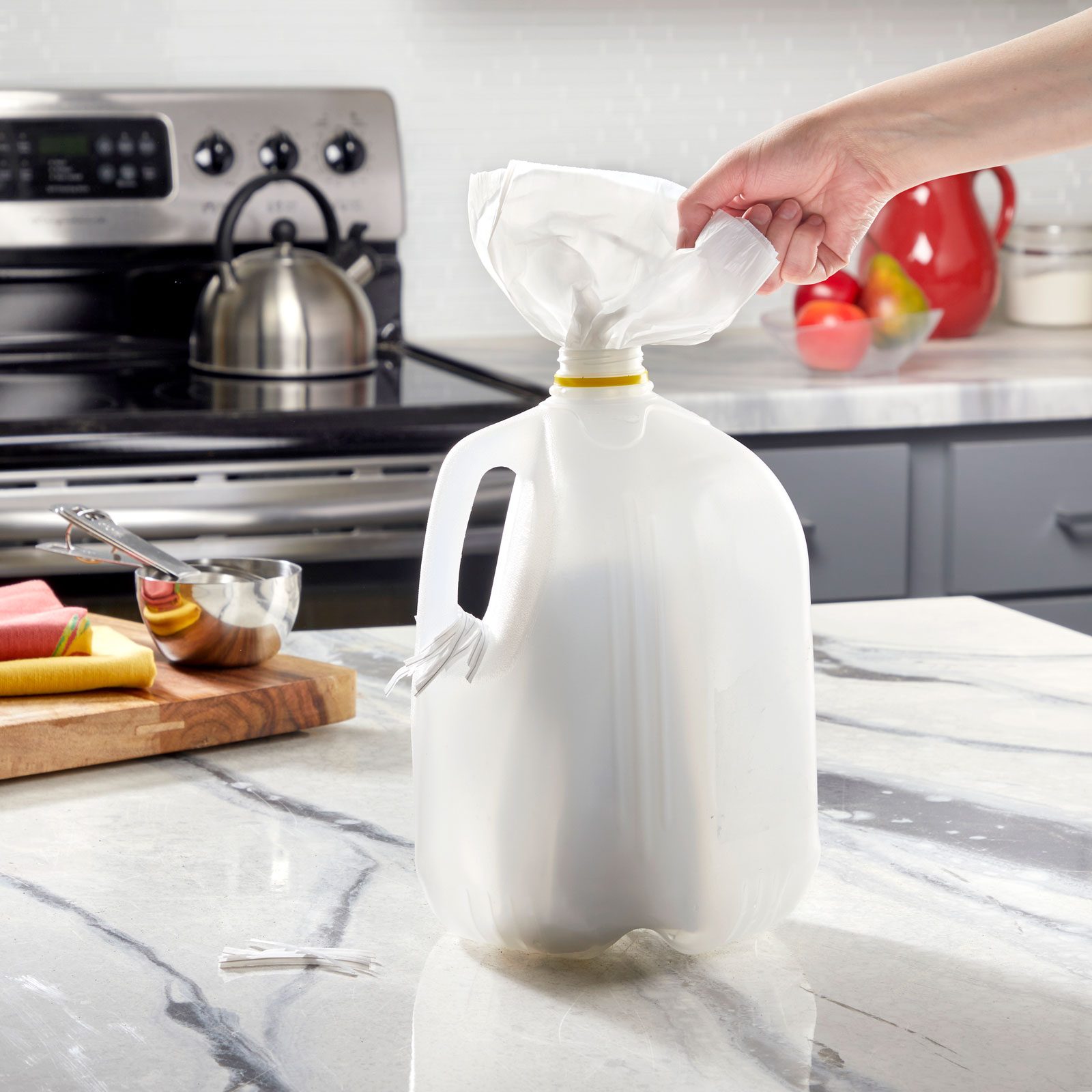 milk jug trash bag dispenser