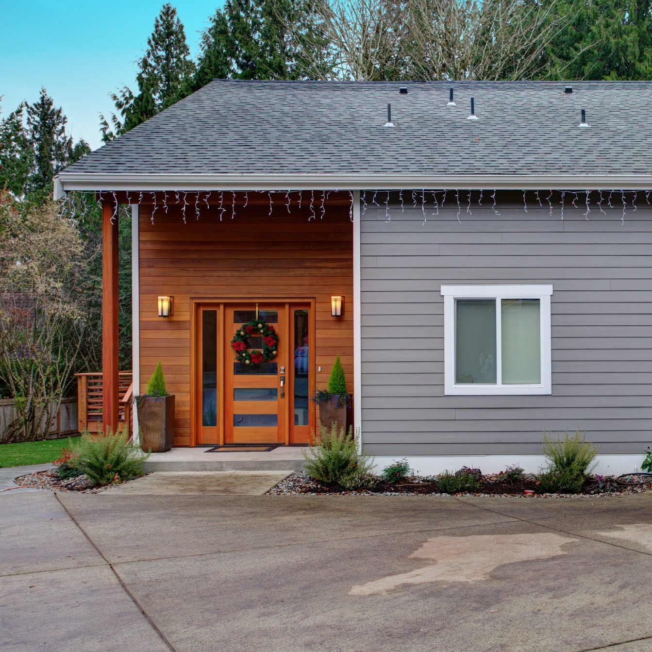 Charming newly renovated home exterior with mixed siding