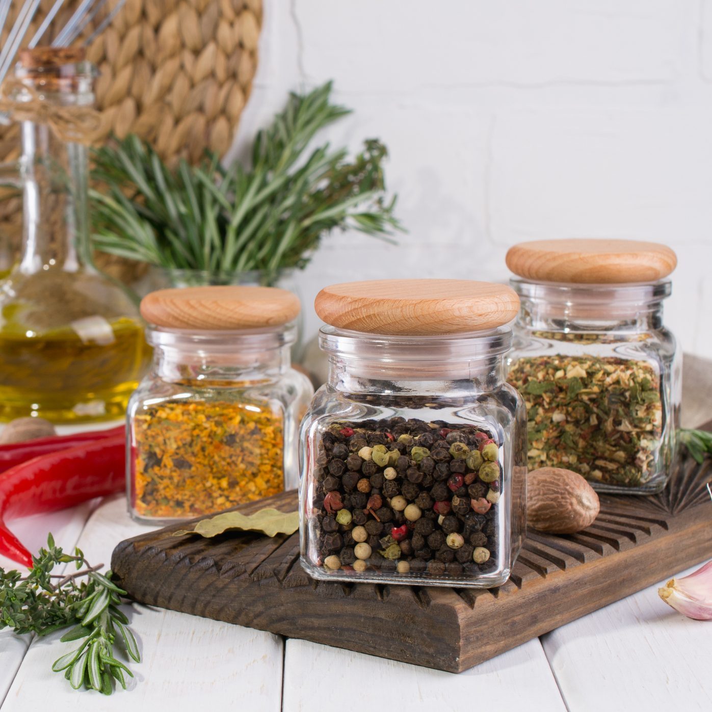 small repurposed candle jars to hold spices