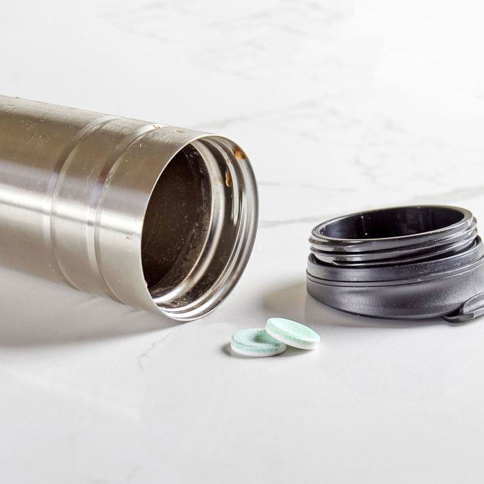 cleaning a Stained Coffee thermos with denture cleaning tablet