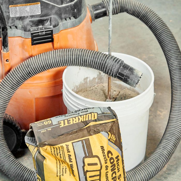 using a shop vac to prevent dust when making concrete
