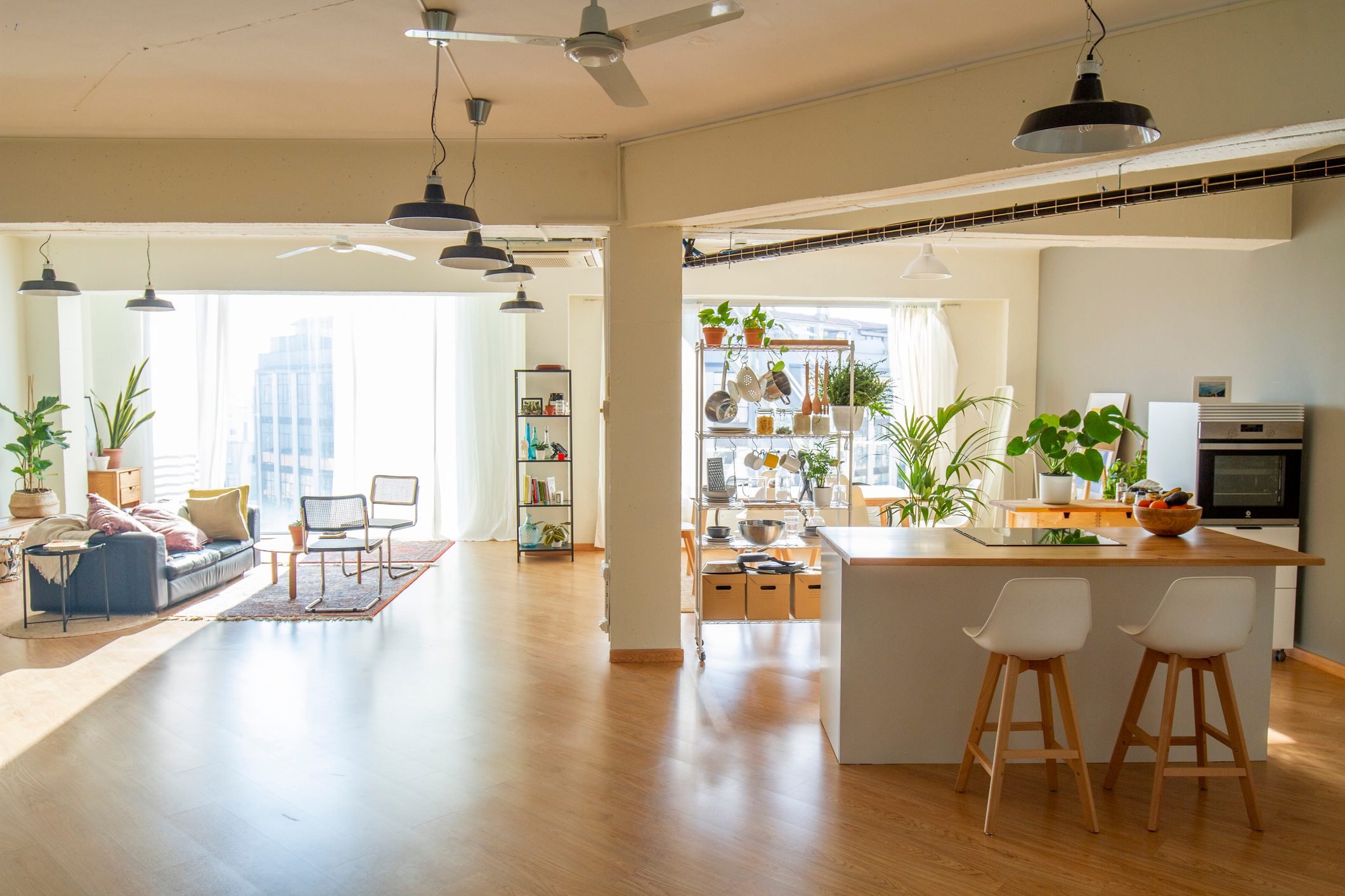 Loft industrial style. Wide only one open space shot. 2 big windows. Open-plan kitchen nordic scandinavian style