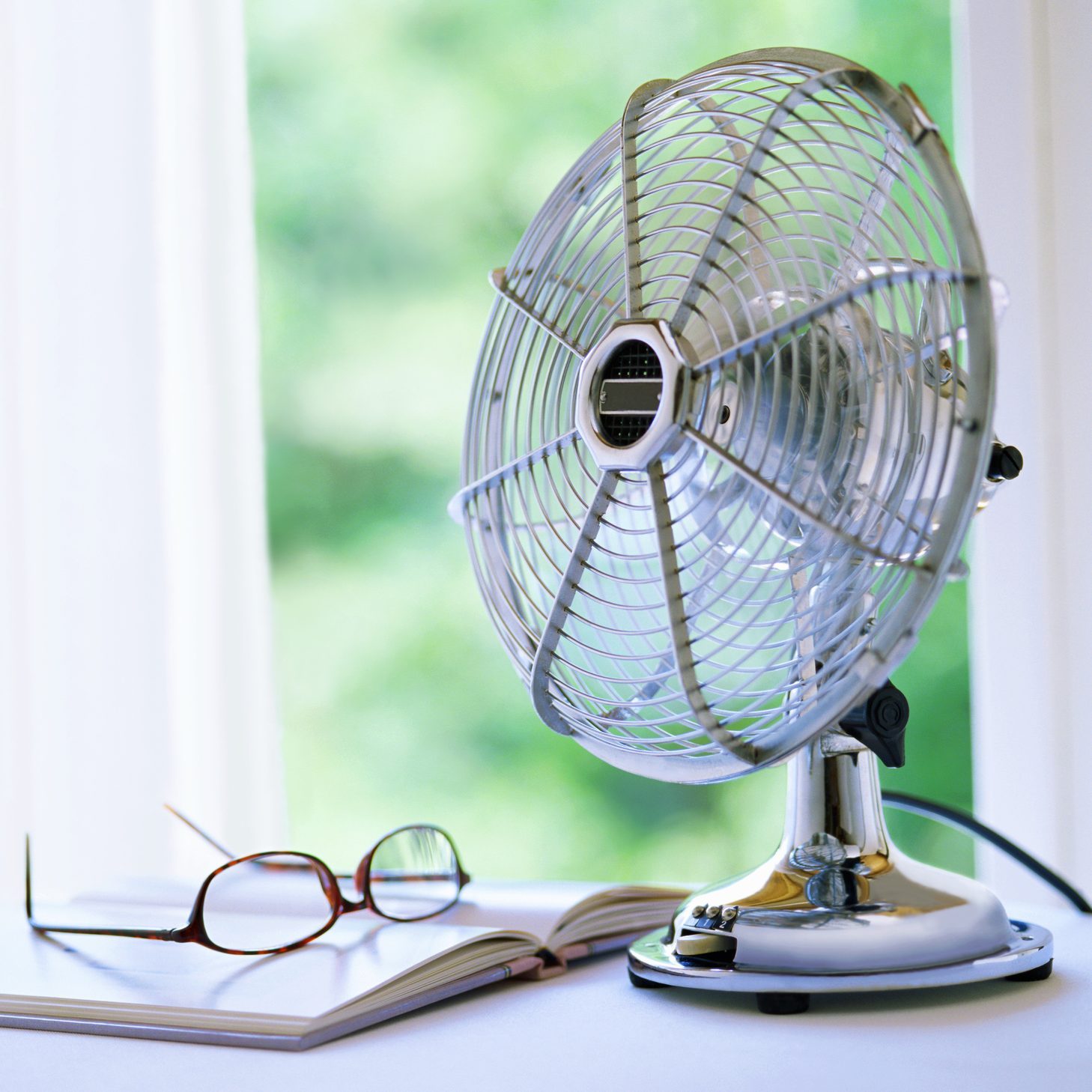 electric fan and book