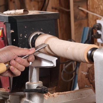 Gettyimages 157403561 Man Using Lathe