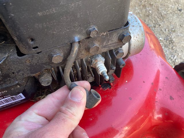 Locate and disconnect the spark plug wire