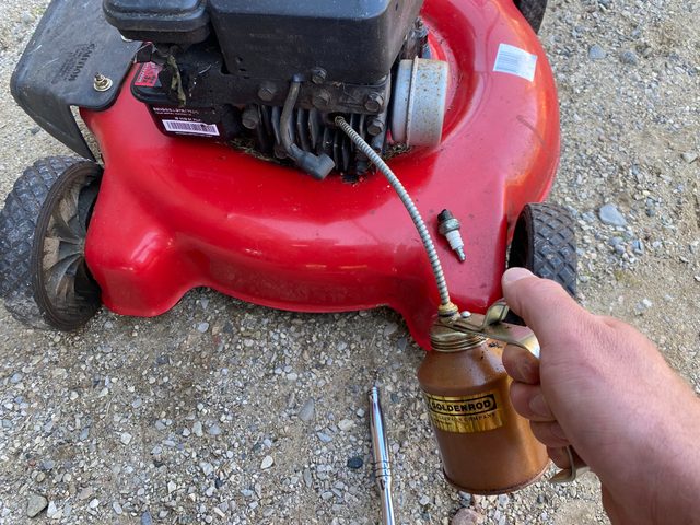 Lubricate the mower piston