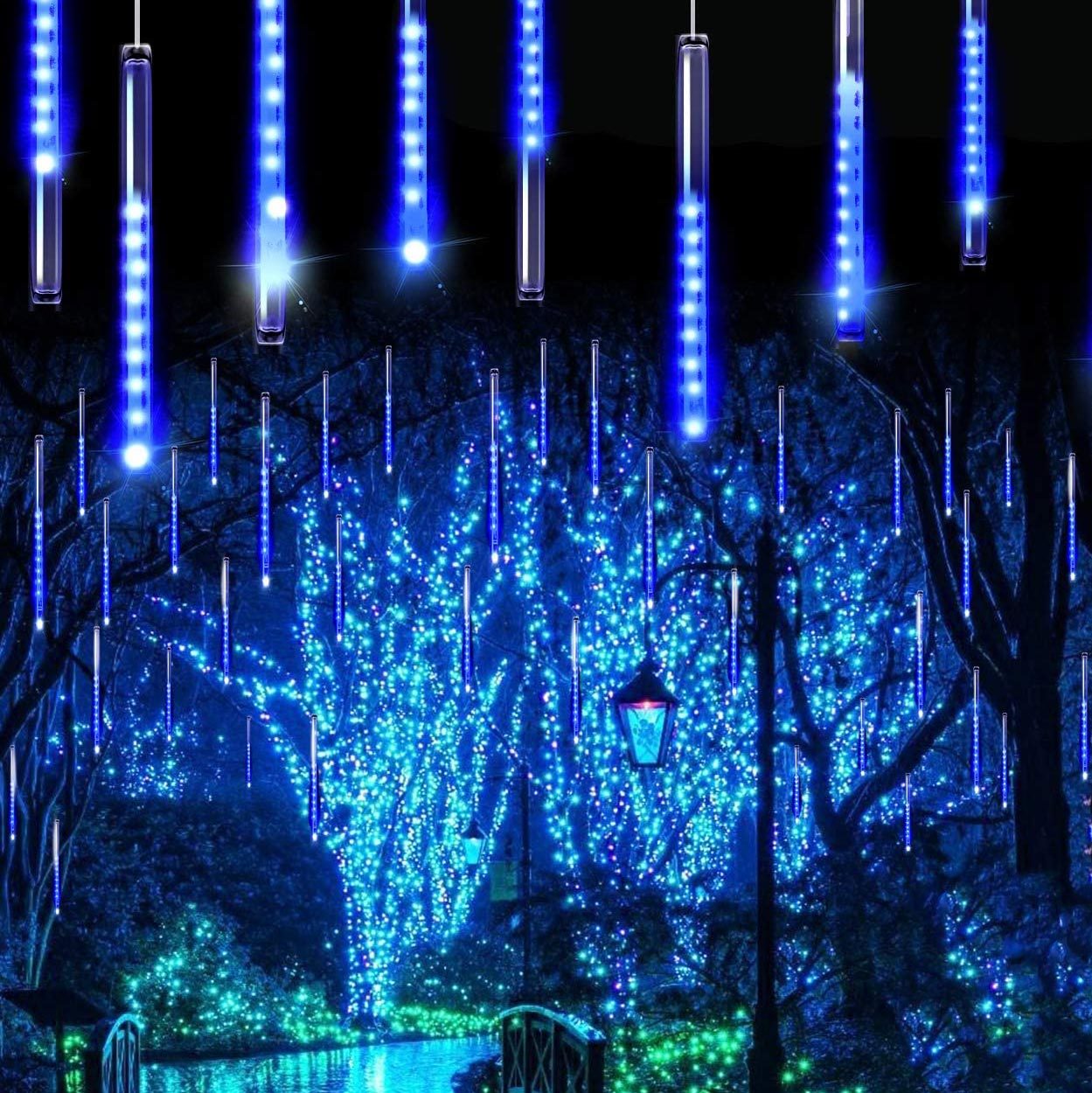 blue icicle lights decorating an outdoor scene for christmas