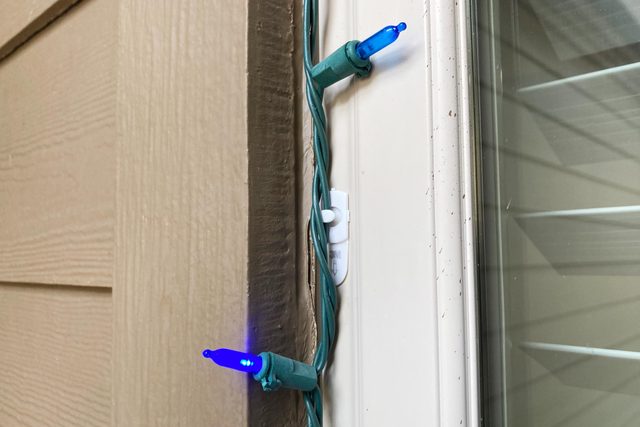 close up of lights clipped around a window