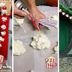 People Are Making Giant Holiday Popcorn Garlands Out of Spray Foam and We're Impressed