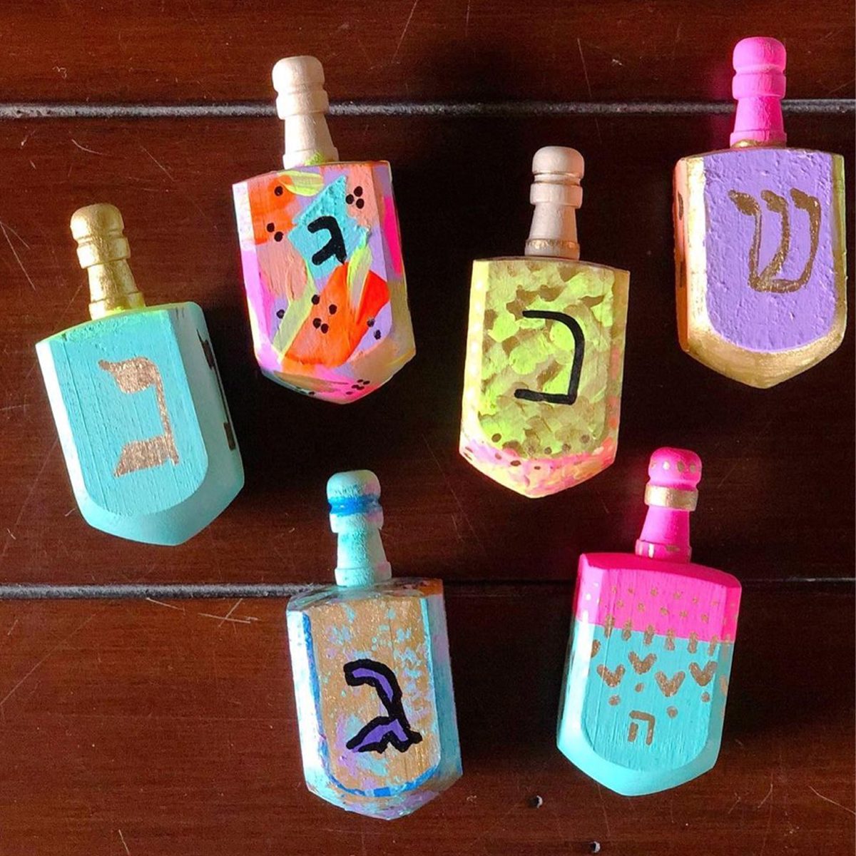 Painted Dreidels Courtesy @theneonteaparty Via Instagram