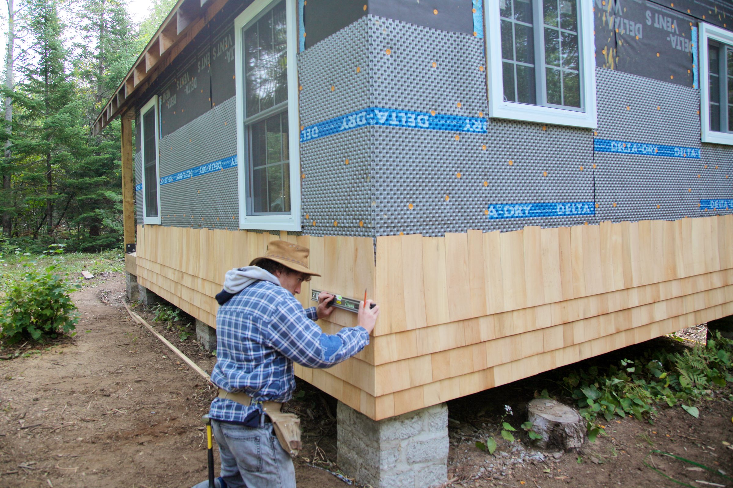 starting to shingle a house