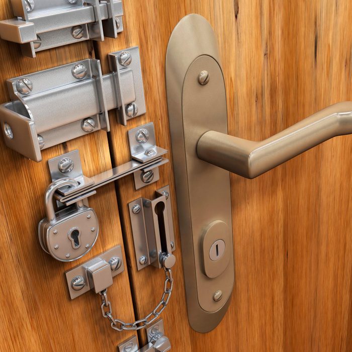 Door With Various Locks on light wooden door