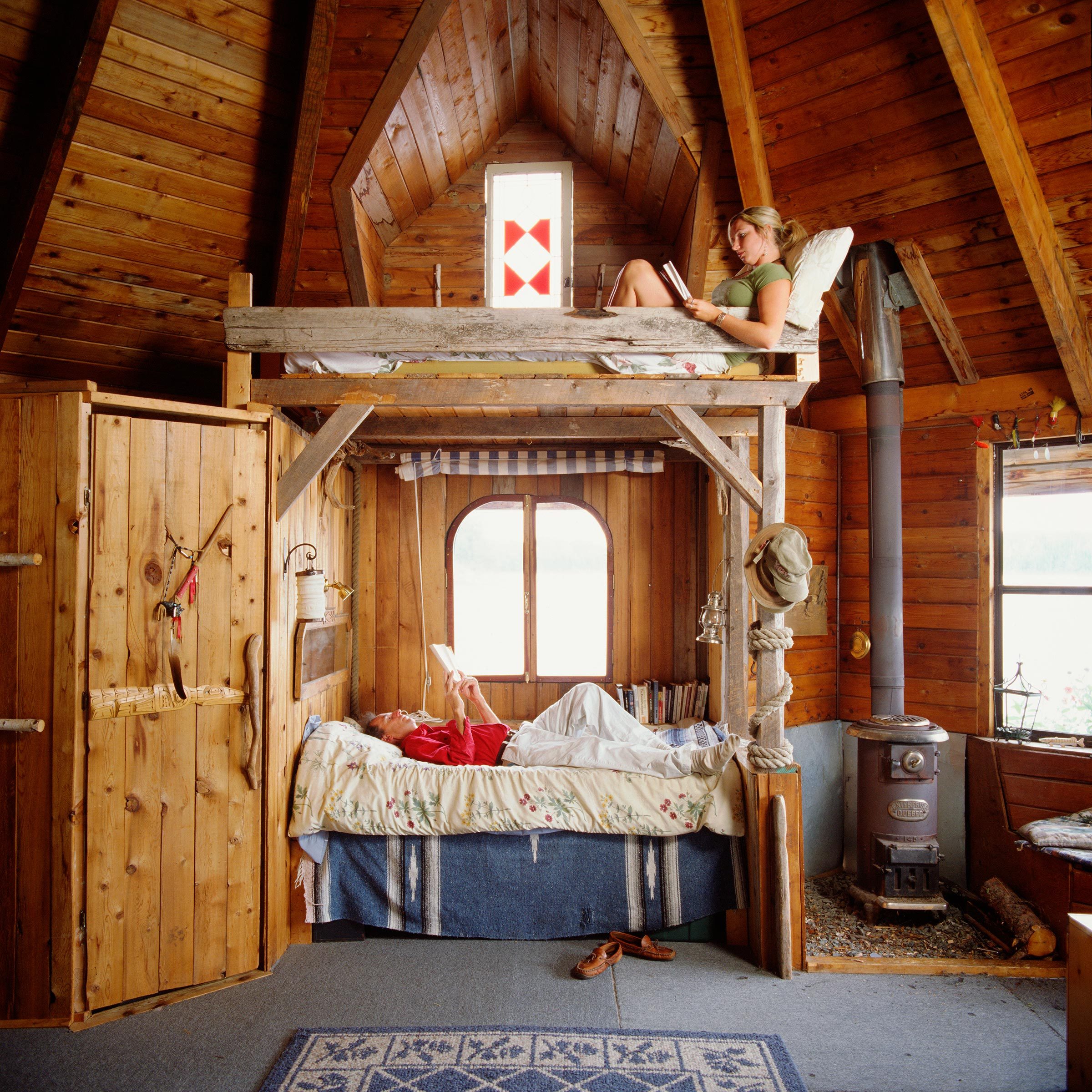 Father And Daughter Lying In Bunk Beds