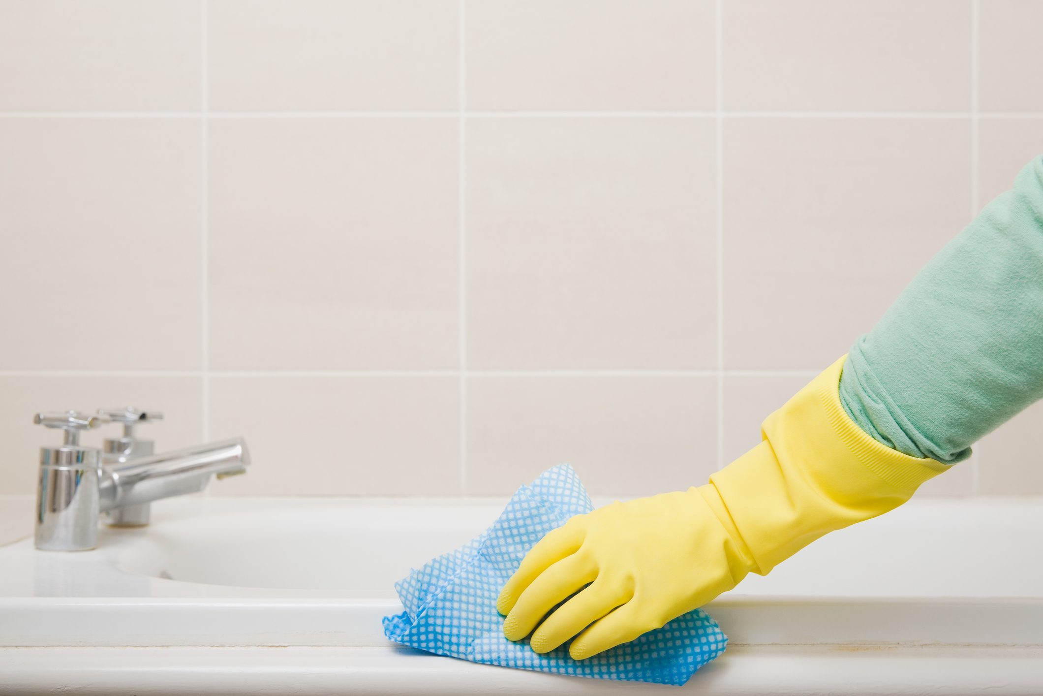 Person Cleaning Bath 2