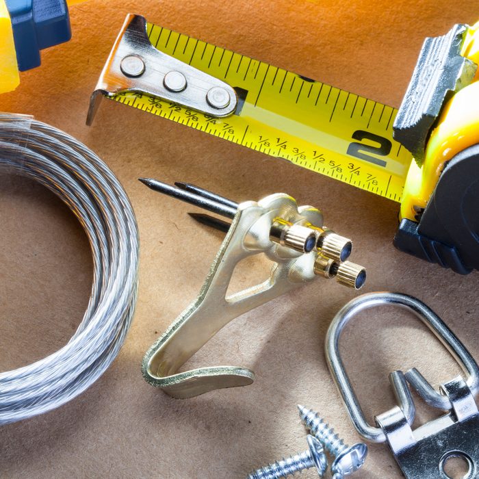 Picture Hanging hardware laying out on counter