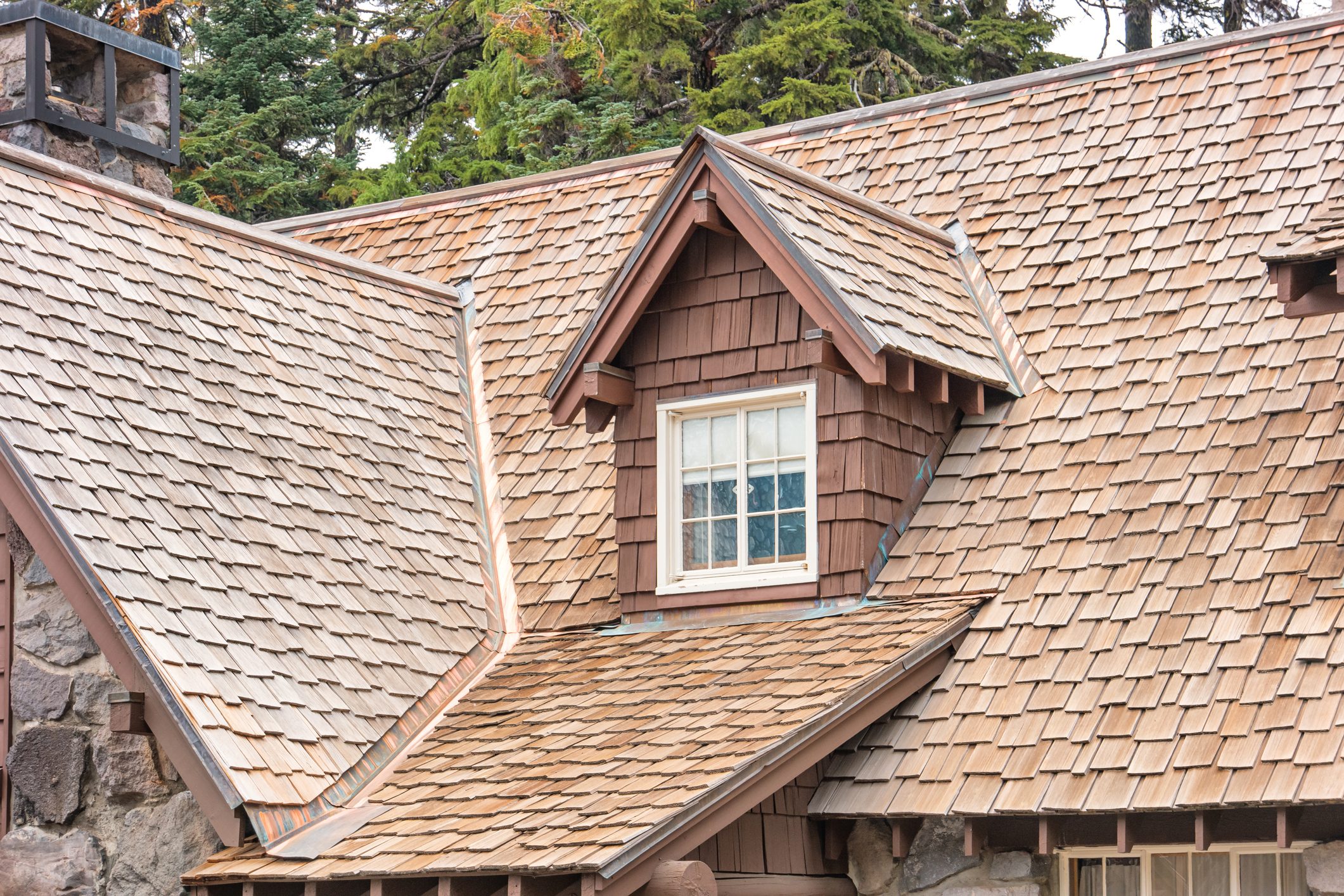 Gable dormer window and wood shingled roof