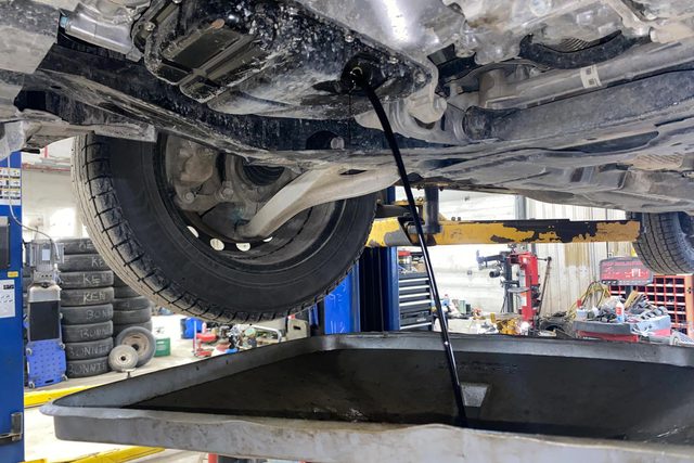 oil coming from the bottom of a car